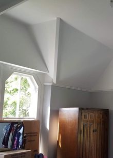A spare room that has been fully decorated with lots of ceiling angles.